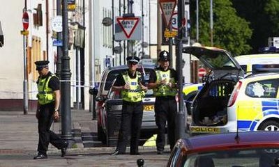 英國(guó)出租車(chē)司機(jī)沿途槍殺路人致13死25傷(組圖)